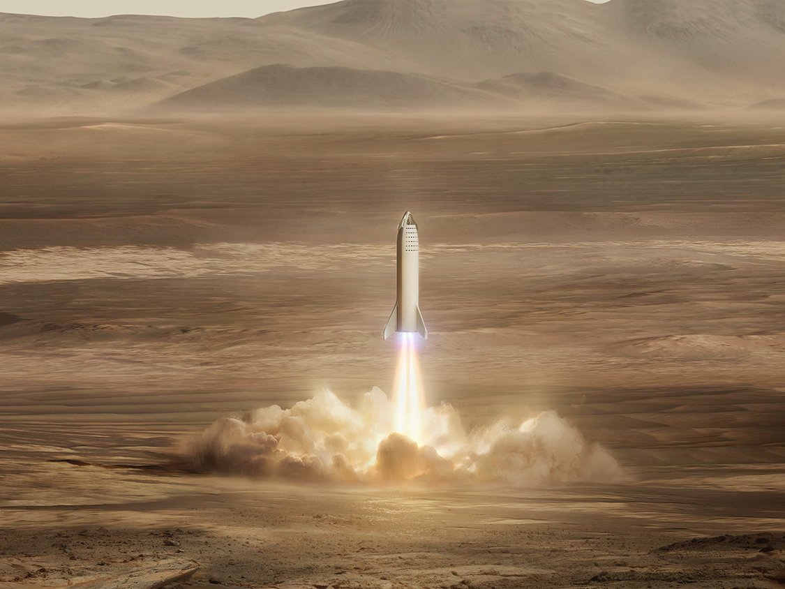 An illustration the Big Falcon Rocket landing on Mars. (SpaceX)