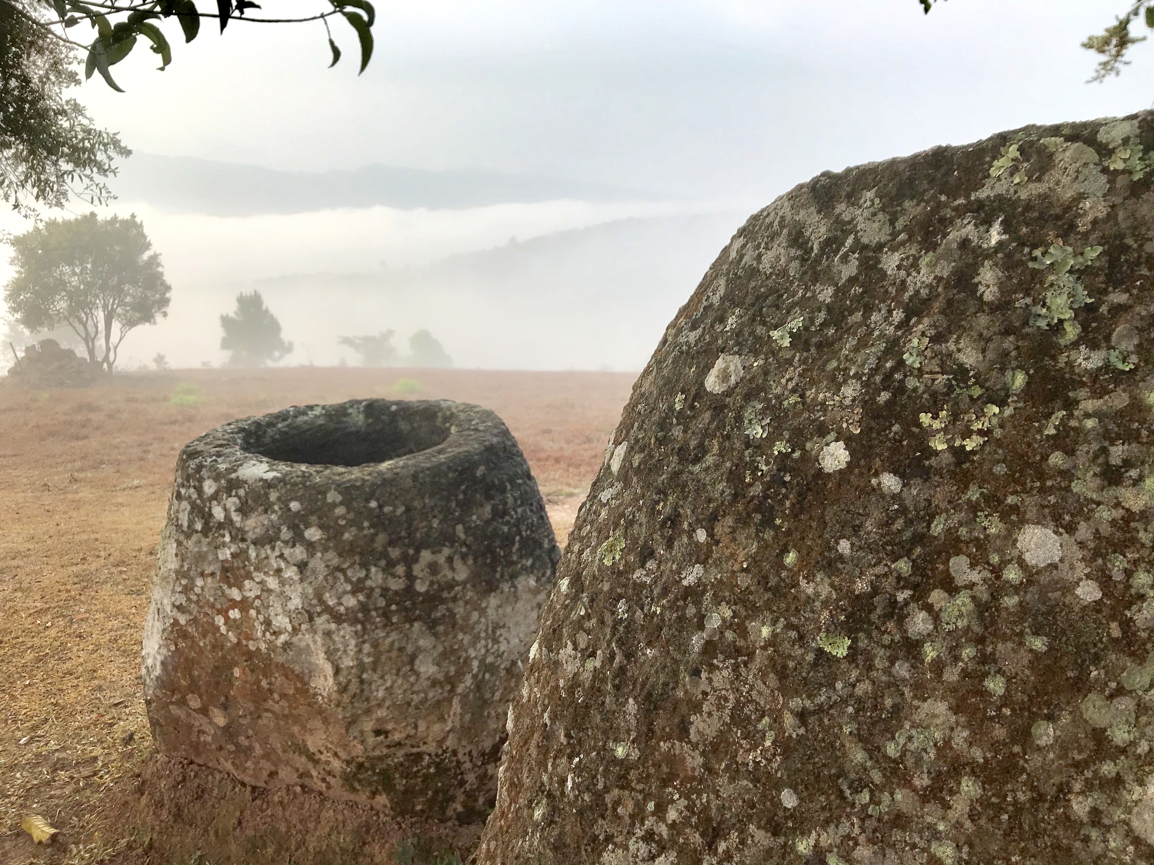 Mist day at Site 2 showing two sandstone megalithic jars