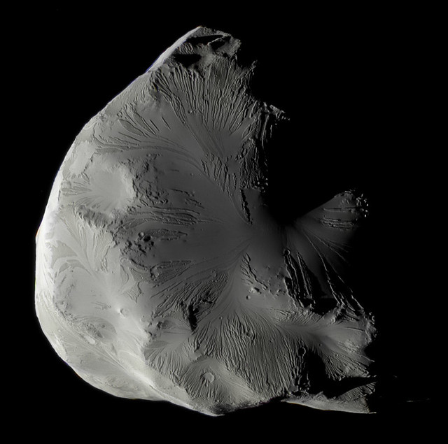 Not all of Kevin's work is on Jupiter. This is Saturn's moon Helene captured by the Cassini spacecraft. (NASA/JPL-Caltech/SSI/CICLOPS/Kevin M. Gill)