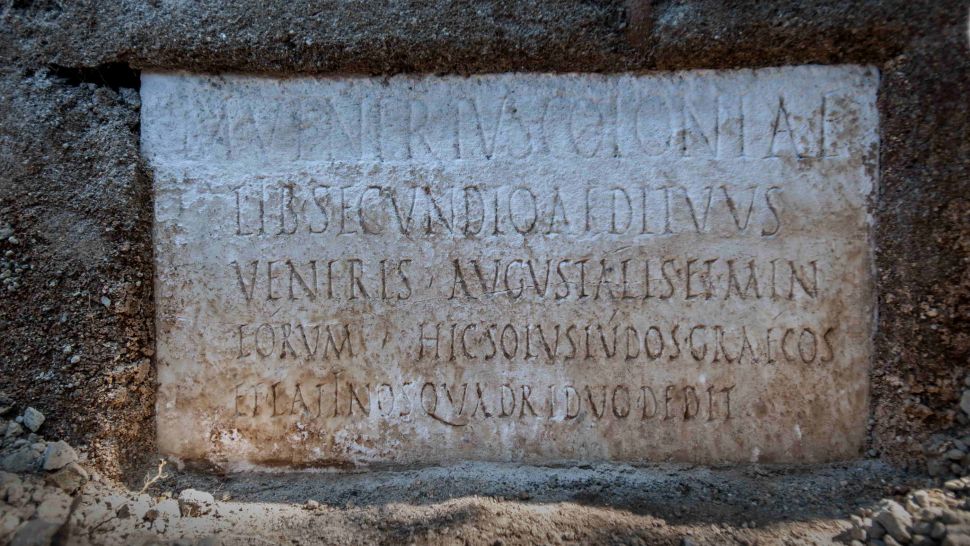 Inscription on the tomb names Marcus Venerius Secundio and says that he performed four days of performances in Greek and Latin as a priest in the imperial cult. (Archaeological Park of Pompeii/University of Valencia)