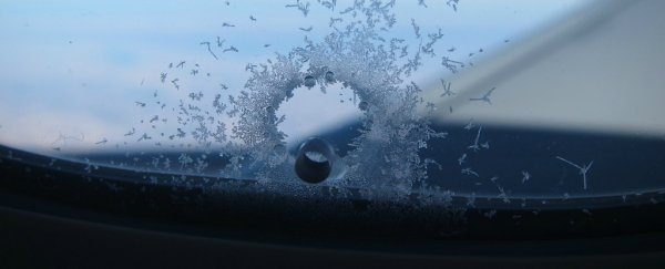 Here’s why there's a tiny hole in airplane windows
