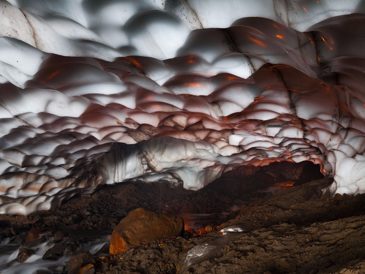 ice-caves-that-reside-within-kamchatka-russia-come-complete-with-stunning-formations-and-hues-of-purples-blues-greens-and-yellows-which-arise-when-sunlight-streams-through-their-glacial-ice