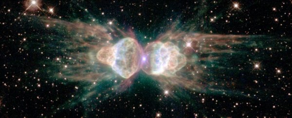 Space lasers are shooting out of this gorgeous nebula, which means it's hiding something