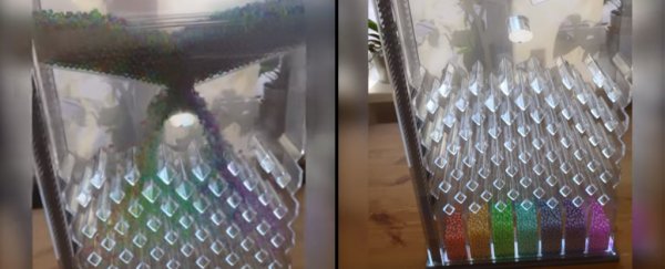 This machine 'quantum' sorting marbles into a rainbow actually has a dirty secret