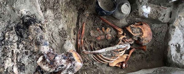 A 2000-year-old mummified 'sleeping beauty' has been found buried with a mirror