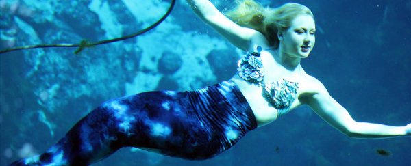 These real life 'mermaids' dance and smile underwater for 30 minutes at a time