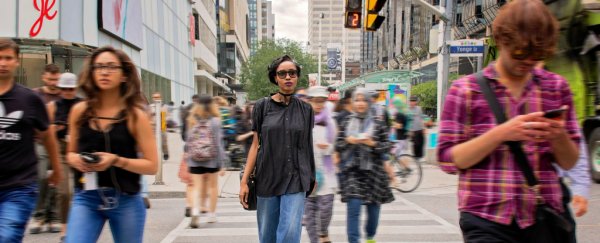Does pushing the 'walk' button actually help you cross the road faster? A transport engineer explains