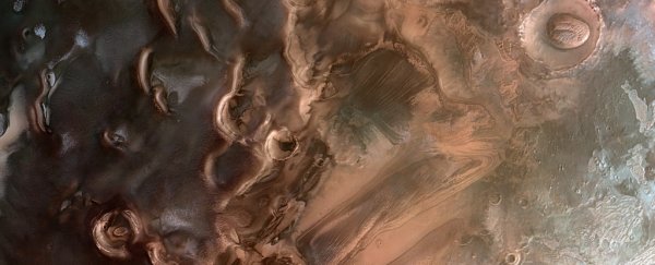 BREAKING: Giant lake of liquid water found hiding under Mars' south pole