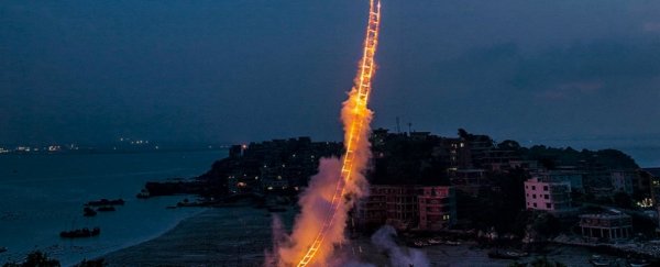 Watch this mind-blowing firework ladder build itself to touch the sky