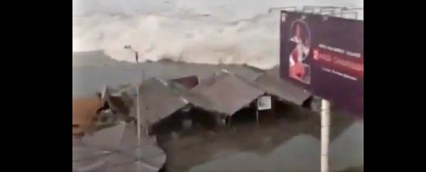 Chilling video shows the moment a tsunami tore through an Indonesia island earlier today