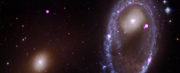 We've just seen what happens when a galaxy punches a giant hole through another