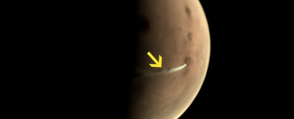 There's a strange white cloud lingering over Mars right now