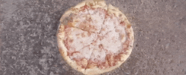 Watch a swarm of maggots devour an entire pizza in just 2 hours, for science