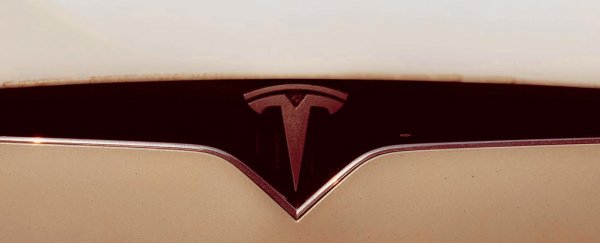 Fatal crash and fire killed a Tesla driver after door handles allegedly didn't work