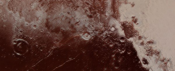 Ammonia on Pluto hints at a massive hidden ocean that could support life