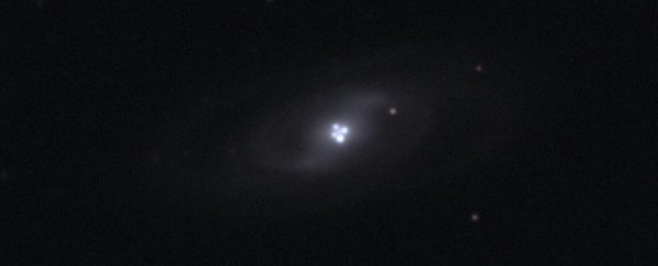 Einstein's cross is helping measure the spin of distant supermassive black holes