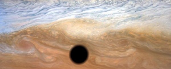 Breathtaking photo shows the Shadow of Io Passing Across Jupiter's Surface