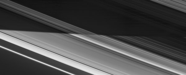 Breathtaking image shows the stark divide between day and night on Saturn's rings