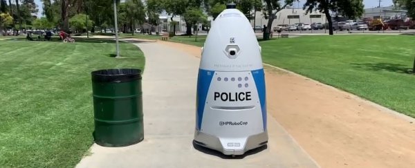 Police Robot on Patrol Completely Ignores Woman Trying to Summon The Police