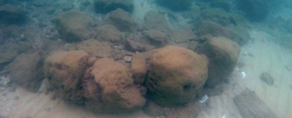Discovery of stone barrier built 7,000 years ago tells a bleak story of rising seas