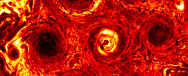 NASA just watched a mass of cyclones on Jupiter evolve into a mesmerising hexagon