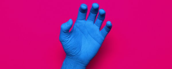 A classic 'fake hand' illusion that tricks the brain could be used to treat OCD
