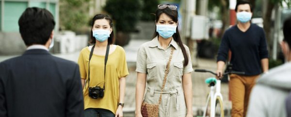Officials just confirmed China's mystery virus spreads by human to human transmission