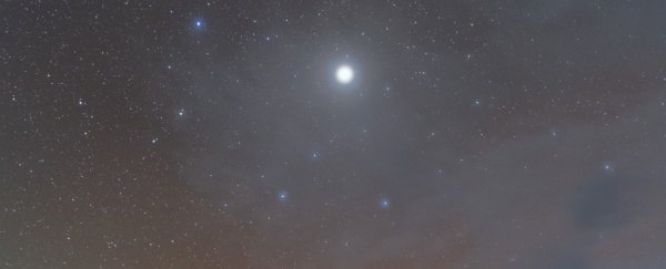 Eerily beautiful photo from a desert shows a rare glimpse of Jupiter's halo