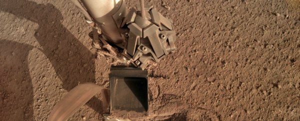 NASA's Mars lander just had to hit itself with a shovel to get unstuck