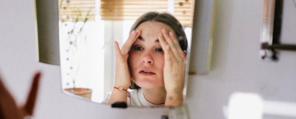 A new study just found female 'period face' is not a thing