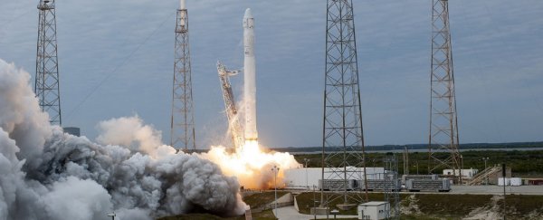 It's official: SpaceX will carry its first humans to the space station next month