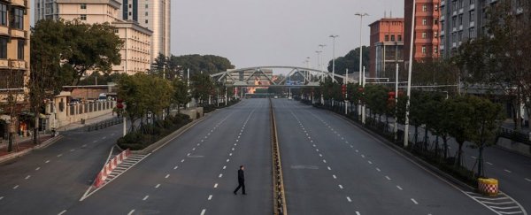 China's top medical advisor warns the country may now face a second wave of COVID-19