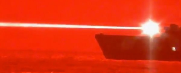 Official footage shows US Navy ship use a laser weapon to destroy a flying drone