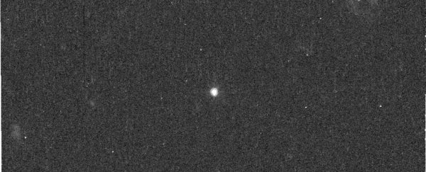 Astronomers may have spotted a tiny moon in the outer Solar System