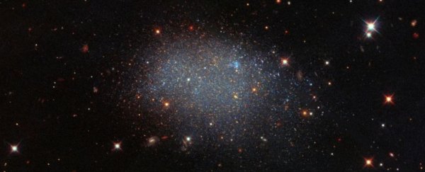 Mesmerising image shows a lonely galaxy isolated by itself in a cosmic void