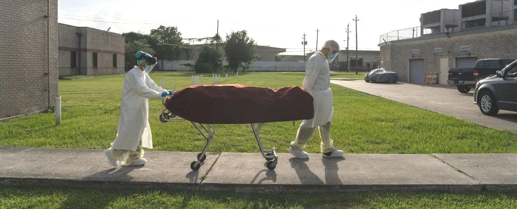 Medical staff with a deceased patient on June 30 in Houston, Texas. 