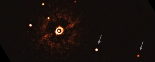 Astronomers reveal first-ever direct image of planets around a Sun-like star