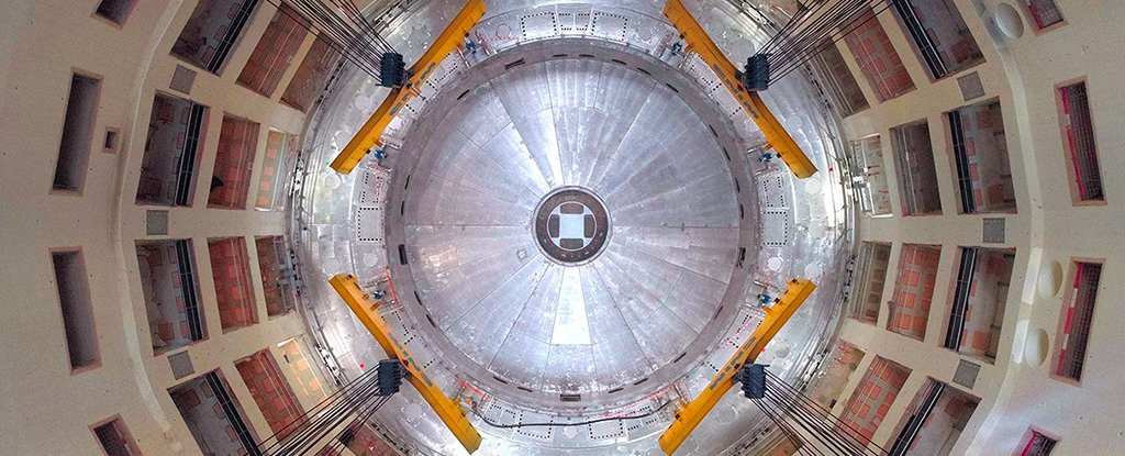 The installation of the first piece of the ITER tokamak reactor. 