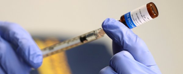 Early US COVID-19 vaccine is possible, FDA head says, even before safety trials end
