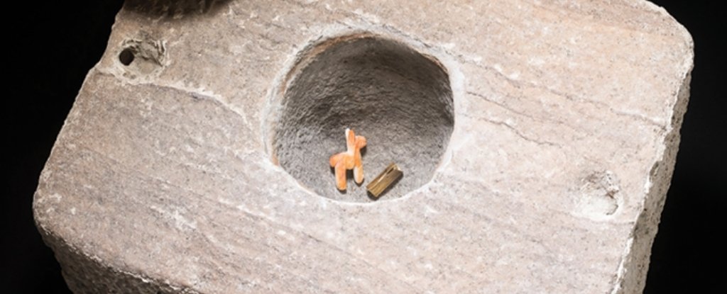 The stone box and its contents. 