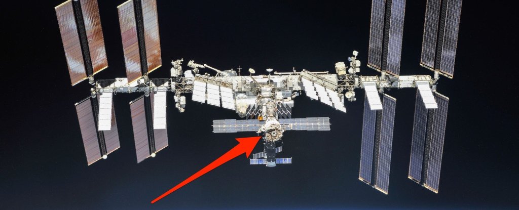 The International Space Station, with an arrow pointing to the Zvezda module. 