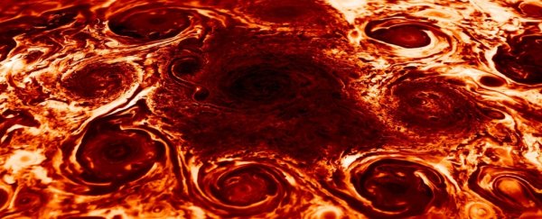 We might finally know how Jupiter's weird polar storms stay together