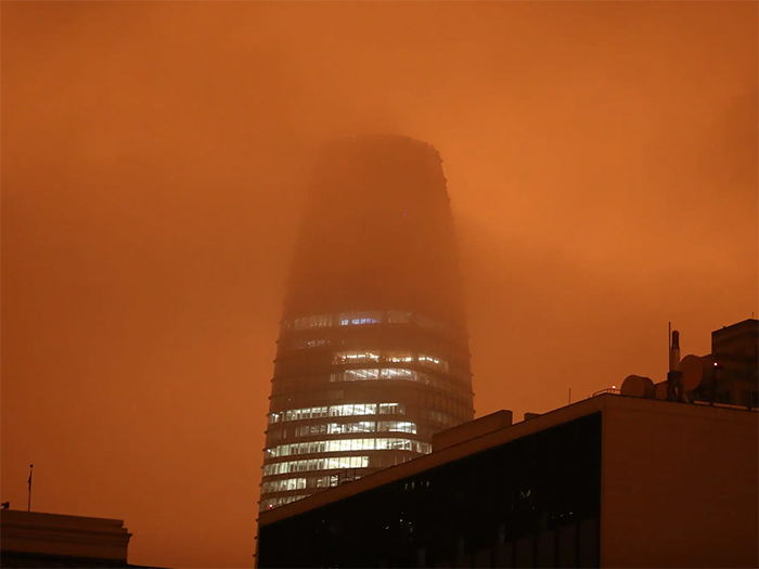 san francisco with red skies looking at sales force tower