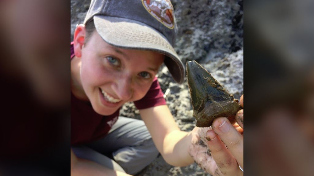 Sarah Boessenecker with one of the fossils. (Robert Boessnecker)