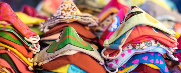 Latest CDC advice says fabric masks could protect you, too. Here's the science