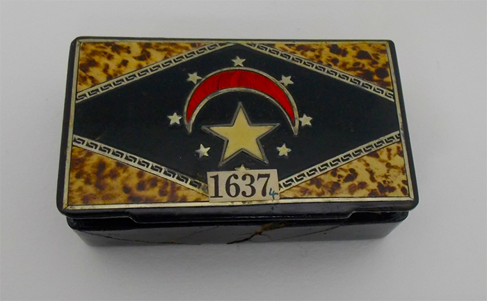 cigar tin holding a giza artefact