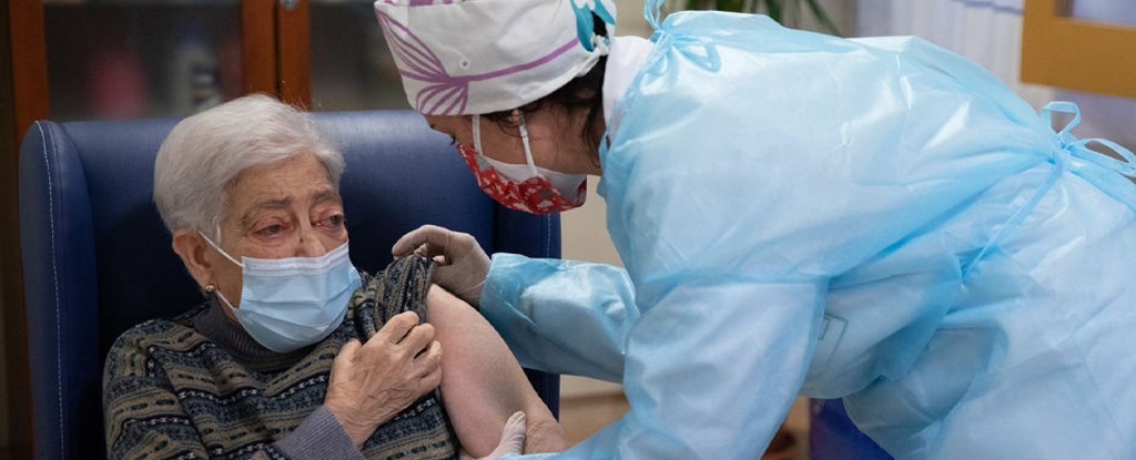 Nursing home resident receiving Pfizer vaccine, 27 December 2020, Spain. 