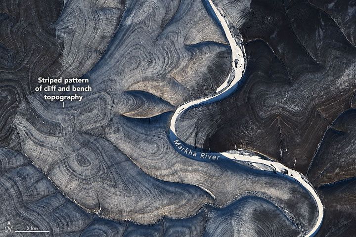 The striped swirls have scientists perplexed. (NASA Earth Observatory/ Landsat 8)