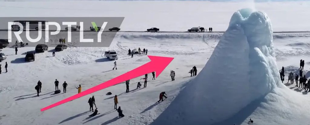 An annotated image of tourists gathering around a 45-ft tall ice cone, which appeared in the Almaty region of Kazakhstan. 