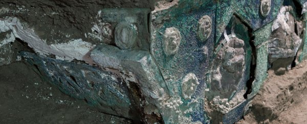 Ancient Roman chariot used in parades unearthed 'almost intact' near Pompeii